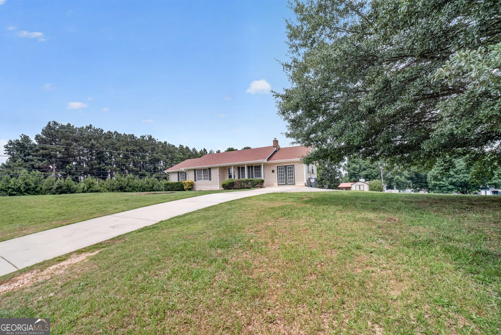 Photo of 2591 Doc Hughes Road, Buford, GA 30519 (MLS # 10796320)
