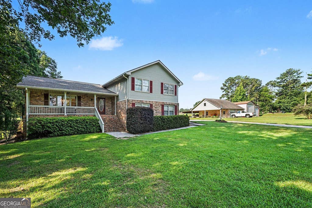 Photo of 740 Smyrna Road SW, Conyers, GA 30094 (MLS # 10785412)