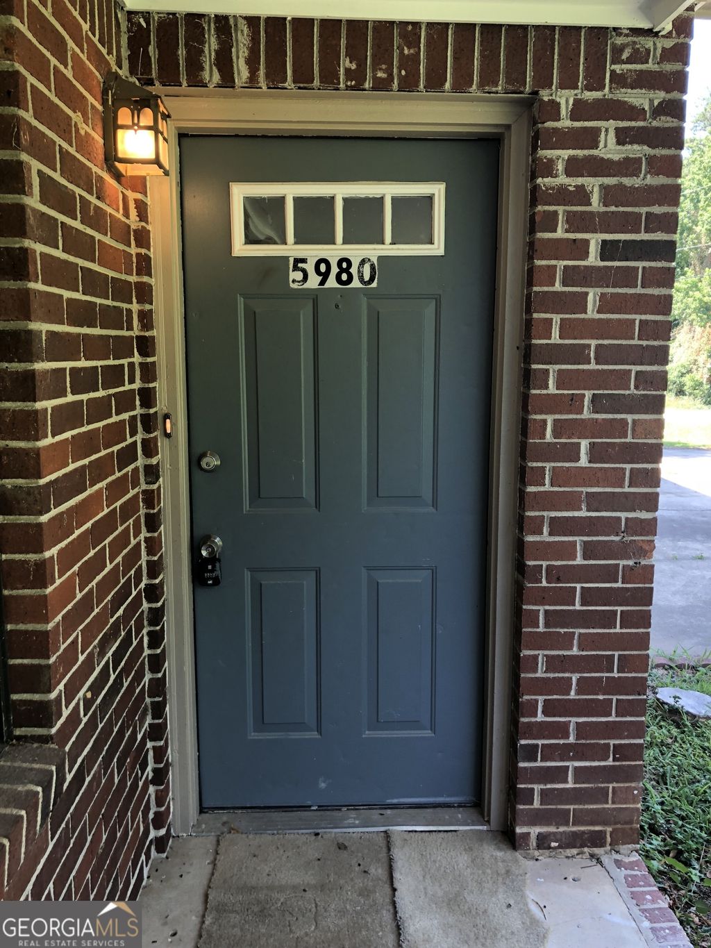 Photo of 5980 Sherwood Place, Ellenwood, GA 30294 (MLS # 10768660)