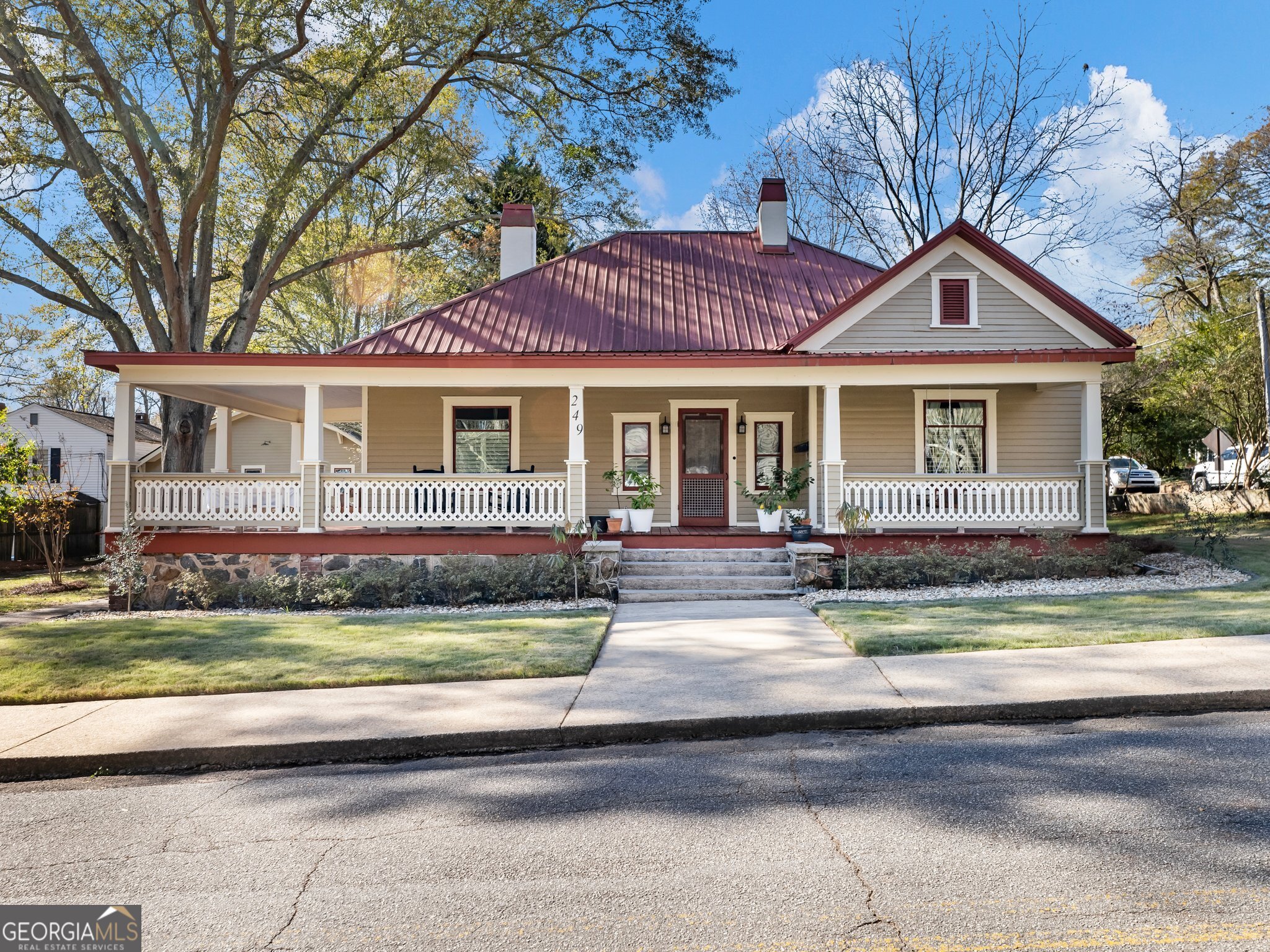 Come Discover the perfect blend of history, modern living in this completely renovated 1914 Arts & Craft inspired Bungalow AND your Mini Fruit Orchard ready to harvest this summer! Every detail of this home has been thoughtfully updated while preserving its timeless character and charm. Nestled in the heart of Downtown Jefferson, this gem offers the ultimate in convenience! It is located walking distance from top-rated schools, charming shops and the city's dining and entertainment options. The wide front porch with its 1900's build influences of stone exterior and artistic front railings, is not only welcoming, but beacons you to slow down and enjoy time outside waving to your neighbors and walkers or enjoying meals here. Be sure and ring the original doorbell as you enter the house into the Gathering Foyer with beautiful fireplace (sealed) and chandelier. To your right, through the original pocket doors, is the Family Room with another fireplace (sealed). Make sure you look up and notice the exquisite bead-board ceilings throughout the home and the second set of working pocket doors to kitchen. This gorgeous kitchen was not a renovation from a "Kitchen Store", but it was meticulously designed to keep with the integrity of an older home. Cabinets were rescued from a 1930's home, refurbished and retrofitted to work in this kitchen. Kitchen conforms with the home, but performs like a modern chef boasting Gas 5 burner Ranger with Dual Fuel, Pot Filler, Solid Surface Countertops, Stainless Vent Hood, Farm Sink, Dishwasher and Refrigerator! Island provides work surface and Breakfast bar. French doors from kitchen open to Grilling and Morning Coffee Deck. **Mini-homesteading ready with persimmon, olives, peaches, pomegranates, figs, guava, bananas and blueberries. Off the Kitchen is the Owner's Suite. Home has been just recently re-designed to provide a truly designated and private owner's suite offering rear back entrance, huge walk-in closets, laundry area and beautiful ensuite with claw foot tub upgraded now for shower, too! Off kitchen is Dining Nook - but, as with any older home there are no true "designated" spaces, and all can be used to fit with new owner's lifestyle! The second large bedroom provides 3rd fireplace (former coal burning), entrance to porch and bathroom. Front room to left of Foyer with 4th fireplace has been used for many purposes in the past, all depending on living needs... A 3rd bedroom (has closet), a Formal Dining Room, office or work out space! Home boasts the original beadboard ceilings, 2 sets of pocket doors, many of the original doors are on slides to give more space, insulated windows, newer hardwood floors, fresh interior wall and trim paint, 4 fireplaces throughout (sealed) and plenty of storage space for home's age! What you cannot see: all foam insulation, newer electric, plumbing- including new sewer line to street, newer HVAC and hardshell ductwork, vapor barrier in crawl space with lights. New custom garage doors, and new siding and windows on Carriage House/Garage. Landscaping has been revitalized & multiple fruit bearing trees/bushes planted to give back that original Homestead feel! BONUS- The Detached 2 car garage - Carriage House has wonderful areas for storage now or is ready to finish for future studio, office or guest suite. Behind Carriage House is even more yard, where once the large family garden was located. The big circular driveway around the old oak tree is not only eye-catching but provides additional off-street parking for guests! Home is also For Sale MLS #10423150