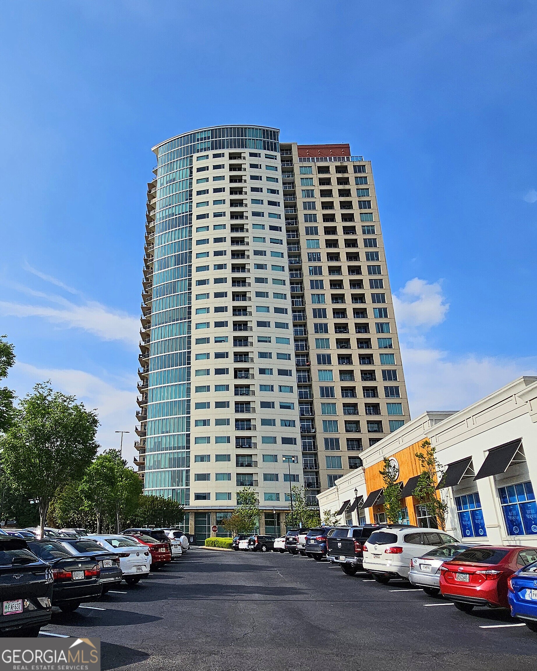 INVESTMENT OPPORTUNITY!  This unit may be leased.  Stunning 1-Bedroom Condo in The Manhattan (Dunwoody) - Move-in Ready! Looking for the perfect place to call home? This 12th floor bright and modern 1-bedroom, 1-bath condo offers comfort, conveniencen, and style in one of Dunwoody's most desirable neighborhoods. Move-in ready! No need to renovate! 12' ceilings, spacious open-concept living room with plenty of natural light. This unit has been updated with new kitchen, including cabinets, stainless steel sink, stainless steal appliances, beautiful kitchen island with granite top, new custom closet designed for one or two persons!! Private balcony-perfect for morning coffee or evening relaxation. Master bedroom with en-suite bathroom and ample walk-in closet space. In-unit washer and dryer! One deeded parking space in the attached garage, close to shops, restaurants, and public transit.Fabulous location! The Manhattan sits next to the Dunwoody Target, and across the street from Perimeter Mall, just minutes away from Marta transportation and schools! Enjoy the great amenities: pool, tennis and pickleball court, beautifully lush outdoor gardens on 8th floor, club room with pool table and virtual golf, spa suite, large fitness center and Sky lounge on the 27th floor! Don't miss out on this rare opportunity! Whether you're a first-time homebuyer, downsizing, or investing, this condo is the perfect fit. Contact us today to schedule a viewing!