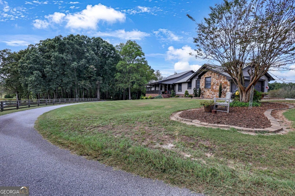 Photo of 1485 Temple Johnson Road, Loganville, GA 30052 (MLS # 10875485)