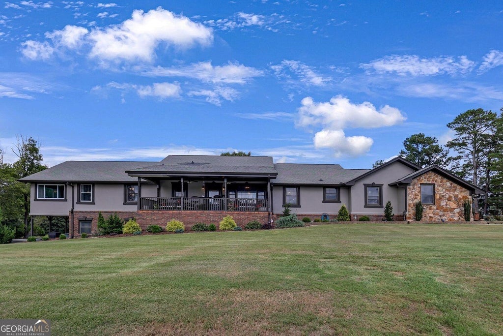 Photo of 1485 Temple Johnson Road, Loganville, GA 30052 (MLS # 10875485)