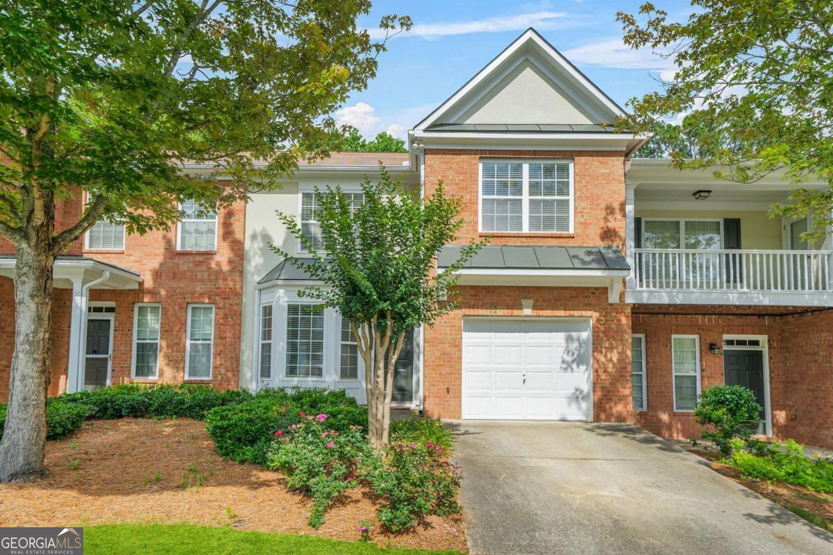 Live Smart in Alpharetta! Stylish Townhome with Premium Location and Low Taxes! Welcome to 399 Grayson Way, a beautifully maintained townhome that delivers on location, lifestyle, and livability. Nestled near top destinations like GA-400, Halcyon shopping, and beloved local spots, this home offers the convenience of Alpharetta living with the financial benefit of Forsyth County taxes. Inside, you'll find an open and inviting main level with all-new flooring and fresh, modern paint that enhances the natural light throughout. A flexible bonus room adds extra space; ideal for a home office, sunroom, or creative studio. Upstairs, enjoy the comfort of a spacious primary suite complete with a sitting area and dual walk-in closets to keep your life organized. Say goodbye to yard work with a private, low-maintenance backyard and HOA-managed exterior. Second-floor laundry makes daily routines a breeze, and guest parking is just steps away, making entertaining easy. Investor-friendly with no rental restrictions, this move-in ready gem is perfect for first-time buyers, downsizers, or anyone seeking value in a high-demand area. Come see it before it's gone!