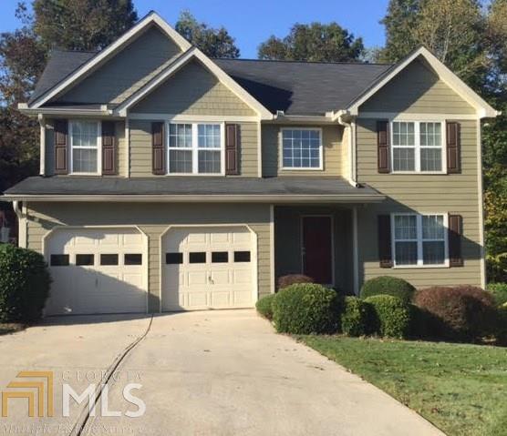 This beautiful 3/2.5 home in the sought after Peachtree Ridge district is a must see! Home has hardy plank siding and a spacious deck overlooking the backyard. Full unfinished basement. 2 story living room with cathedral ceilings. Hardwoods throughout main. Master bedroom has trey ceilings and walk in closet. Kitchen has tons of counter space and has a view into the living room and formal dining room. Subdivision is a swim tennis community and is located near Suwanee's many parks, Mall of GA, and I-85.