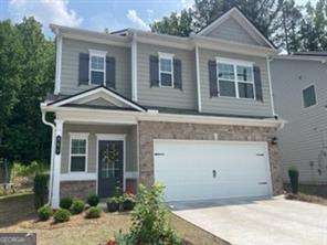 Move In Ready Sept 01! Fabulous open first floor, the kitchen delight featuring a large pantry, stainless steel appliances, 42" upper cabinets, a breakfast area, granite counter tops, and a center island with pendant lighting overlooking the family room. The great room is warm and welcoming with a gas fireplace. Outdoor lovers will enjoy the easy access to the covered rear patio from the large eat-in kitchen. Easy maintenance luxury vinyl plank throughout the main floor. The second story Owner's suite features a walk-in closet, owner's bath with tile shower, and double vanity. Three guest bedrooms are separate from owner's suite. All overlooking a private wooded backyard. Lawn maintenance included. Etowah HS District! Conveniently located about 5 minutes to HWY 75 and 575.