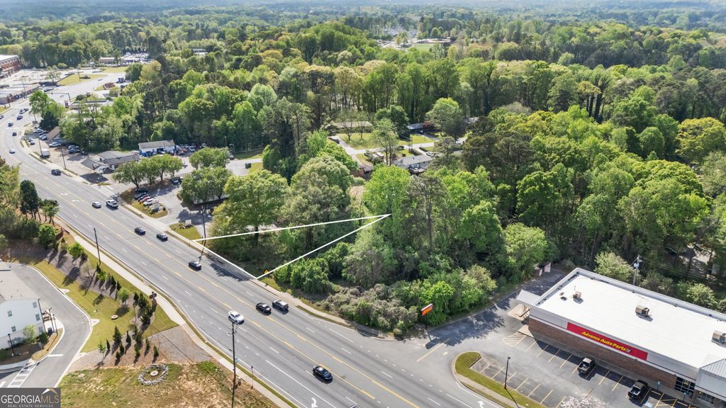 Photo of 4895 Lawrenceville Highway NW, Lilburn, GA 30047 (MLS # 10727956)