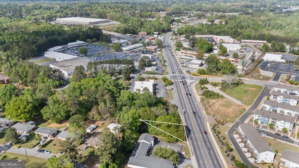 Photo of 4895 Lawrenceville Highway NW, Lilburn, GA 30047 (MLS # 10727956)