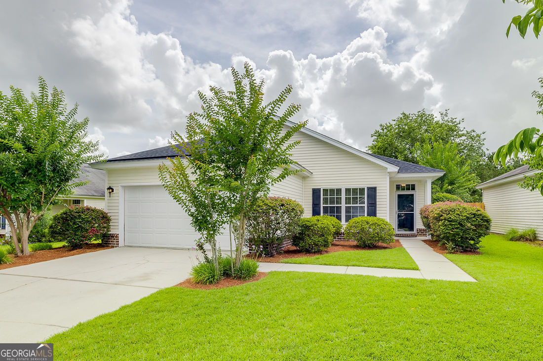 Completely renovated lagoon-front single story four bedroom home in the Waverly section of the Savannah Highlands community. Enjoy the exceptionally peaceful lagoon views from the covered and screened back porch. 2025 renovations include new architectural shingle roof, new plank vinyl flooring throughout, interior completely repainted, updated lighting and plumbing, refreshed landscaping, and made to sparkle like new! The HVAC system was replaced in 2023. The water heater was replaced in 2021. Beyond good as new with a spectacular and serene view! (Three photos are virtually staged to help picture the home furnished.)