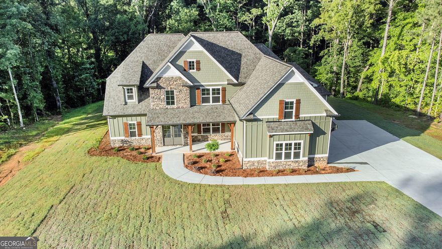 ABSOLUTELY STUNNING 6 BEDROOM- 5 FULL BATH, HUGE 4 CAR GARAGE, 4,215 SQUARE FOOT HOME ON 5.14 Ac. LOT IN SOUGHT AFTER AREA!! This home is PERFECT for ENTERTAINING and boasts the best OPEN CONCEPT with the Family room, Breakfast area and kitchen- ALL OPEN! You will love the natural light that filters in from the HUGE windows across the back of the home with a patio off the breakfast area with an all seasons fireplace. Huge Master Suite offers a trey ceiling; Quarts counter tops, tiled shower and walk in closet. The other bedroom on the main level can be used for flex space: office/classroom/nursery. The second story offers a magnificent recreation/media room and 4 bedrooms and 3 full baths. This area is highly sought after. This estate lot is PRIVATELY OWNED with NO HOA! Northwood Estates is a 64 acre premier development in North Carroll County with ONLY 14 additional homes by the same builder. Conveniently, located to I-20, Atlanta and Hartsfield Jackson Airport.  (Agent/ Owner Relationship)