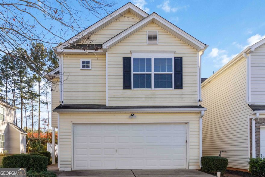 Welcome to 6265 Smoke Ridge Lane in the sought-after Mountain Ridge community of Forsyth County! This beautifully updated 3-bedroom, 2.5-bath home built in 2005 offers comfort, modern finishes, and an ideal location just minutes from top-rated schools, shopping, and dining.    Freshly painted throughout (2024), the home features new carpet in the family room, bedrooms, and hallway, LVP flooring in the kitchen and dining area, and tile flooring in all bathrooms. The two-story family room showcases a cozy fireplace and abundant natural light, creating an inviting space for both relaxation and entertaining.    The kitchen boasts granite countertops, stainless steel appliances, and an open-concept layout that seamlessly connects to the dining area-perfect for everyday living and gatherings. Upstairs, the spacious primary suite offers a private ensuite bath and generous closet space, while secondary bedrooms provide flexibility for family, guests, or a home office.    Enjoy outdoor living in the large, level backyard, ideal for weekend cookouts, play, or simply unwinding. The home's location provides easy access to GA-400, Lake Lanier, The Collection at Forsyth, and award-winning Forsyth County schools.    This home combines modern updates, functionality, and a prime Forsyth County location-move-in ready and waiting for its next owner. Schedule your private showing today!