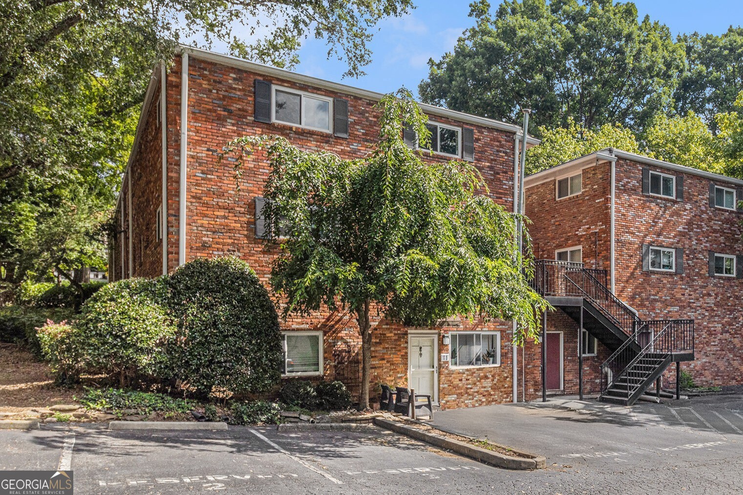 Move-In Ready Midtown Condo Just Steps from Piedmont Park & The BeltLine! Tucked in the heart of Midtown, this Fully Renovated Ground-Level Unit offers unmatched Walkability and Easy Access to Piedmont Park, The BeltLine, top-rated dining, shopping, MARTA, and more. Renovated down to the studs in 2022, the home features Neutral Finishes and thoughtful updates throughout including high-end Ceramic Tile Flooring, Fresh Paint, New Fixtures, and Updated Cabinetry, Counters, and Backsplash in the Kitchen. The light-filled living and dining areas enjoy abundant southern exposure, filling the space with warm morning sunlight, especially welcome in the cooler months. The Bedroom offers a peaceful retreat with direct access to a beautifully Renovated Bathroom, complete with a Modern Vanity and Custom Tilework. Utility costs stay low, making day-to-day living even more convenient. Best of all, Assigned Parking Space #11 is just steps from the front door no parking decks, long hallways, or elevators to deal with. With no stairs to navigate and turn-key condition throughout, this unit is ideal for first-time buyers, weekend city-dwellers, or investors seeking easy, low-maintenance living in one of Atlanta's most vibrant neighborhoods.