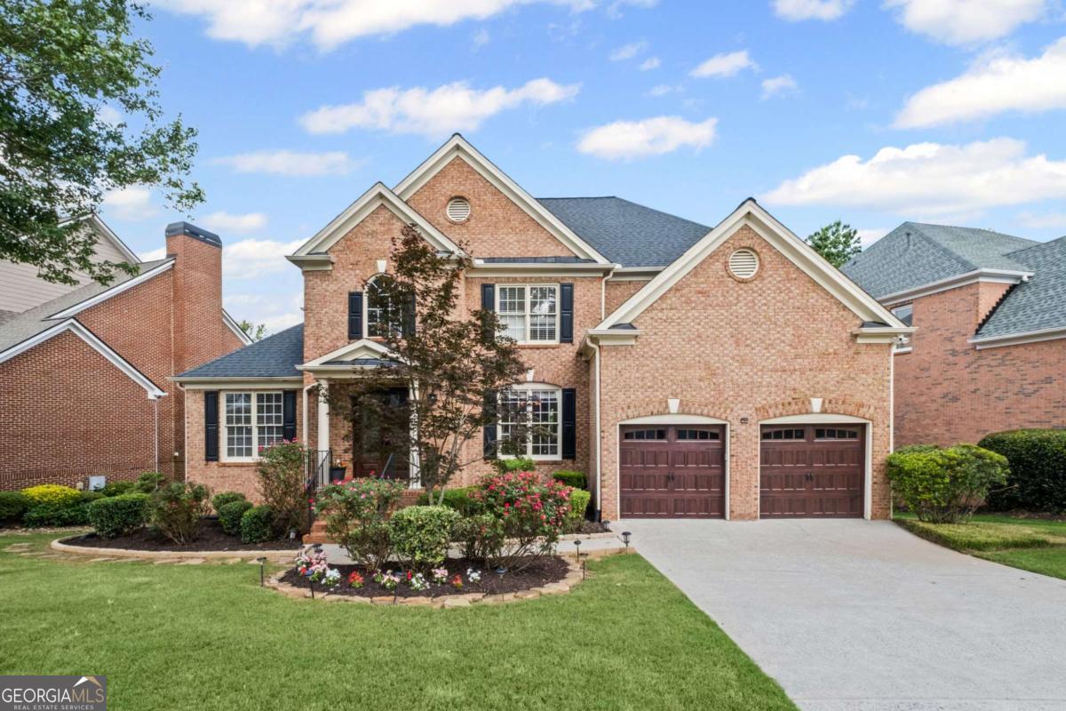 Discover your dream home in this exquisite 5-bedroom, 4-bathroom residence, perfectly situated in the heart of Milton's top-rated school district and close to Innovation Academy. This stunning property offers an unparalleled blend of sophistication, comfort, and convenience, just a short stroll from downtown Crabapple and The Green. Located minutes from Halcyon, Avalon, and GA 400, this home offers unbeatable access to dining, shopping, and entertainment. Step inside and be captivated by the thoughtful upgrades throughout. Newly updated kitchen with new appliances, freshly painted living area, all bedrooms boast new flooring and custom-built-in closets. The renovated bathrooms feature sleek designs and spacious walk-in showers. The home's exterior has been updated with new French entry doors and garage doors, a newer roof, enhancing its curb appeal. New smart garage openers have been installed, adding a touch of modern convenience. But the true gem of this property lies in its incredible outdoor living space. Prepare to be enchanted by the complete backyard paved courtyard-style oasis, designed for ultimate relaxation and entertaining. This private sanctuary features an amazing gazebo and a cozy fire pit, perfect for gathering with loved ones under the stars. The fully finished basement is an entertainer's delight, offering a full kitchen and a dedicated media room, office, and game room, providing endless possibilities for recreation and hosting guests. Beyond the home itself, you'll love the active lifestyle neighborhood amenities, including swim and tennis courts, a community clubhouse, a playground with a basketball court, or take a stroll around the scenic neighborhood lake. and enjoy year-round social events that foster a vibrant community spirit. This home is more than just a residence; it's a lifestyle. Don't miss your chance to own a piece of paradise in one of Milton's most sought-after locations!