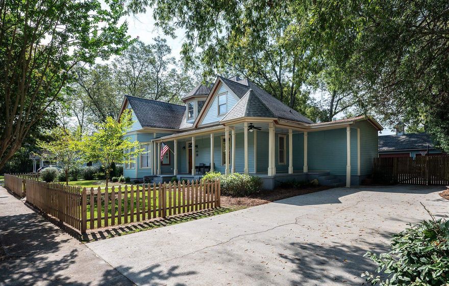 So much bang for your buck in this most excellent historic home right in downtown Statham. Quite the lifestyle awaits! This center hall home was built for the town doctor in 1907 and had extensive updates and renovations in the 1990's, including plumbing, electrical, windows, roof, kitchen, baths, and more. Sellers continued the trend when they purchased, and it shows. Totally renovated Owner's Suite on main is a triumph and was restored down to the floor joists, new sewer and water main outside, new front door, and more. Huge Living Areas and Soaring 12 ft ceilings. Grand Kitchen with spacious island, cabinets and counters galore, and a pantry that will drop your jaw. Second bedroom on main is also an en suite with a private bath. Half bath on main as well. Huge laundry/mudroom off the back of the home. Upstairs are two more bedrooms with one that lives like a huge rec room, the likes of which are typically seen in houses much newer than this. Hall Bath rounds out the upstairs. Very well built, oversized three car garage was added in the 1990's and is a major selling point. There is beckoning another very user friendly cottage-style studio outbuilding calling from the back of the expansive fenced back yard. Art Studio? Writer's Retreat? Work from Home? The choice is yours. Home has a roomy deck off the back of the home as well, making for outdoor spaces everywhere from the rocking chair front porch to one heck of a playground/backyard featuring mature pecan trees and a mini orchard with peach, plum and apple trees. Much more to see and tell, so plan your tour asap! You'll be glad you did. They don't build them like this anymore! NOTE ON STATHAM: ANTIQUE SHOPS, RESTAURANTS, AND OTHER SMALL SHOPS ARE RIGHT THERE FOR A REALLY FUN DAILY AND WEEKEND LIFE. WALKABLE, JOGGABLE, BIKE FRIENDLY. STATHAM ROCKS AND IS GETTING EVEN BETTER BY THE DAY! COME SEE WHY!