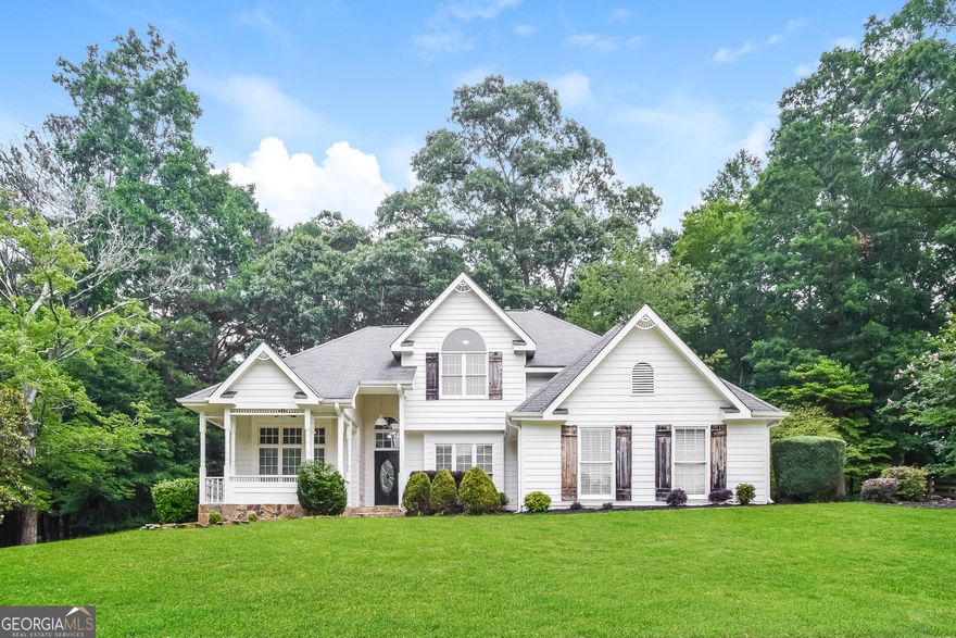 Welcome home to Lake Redwine Plantation! This home sits at the front of this highly desirable neighborhood and is just a short walk to the clubhouse, pool, tennis courts and lake. The location and highly desired schools make this a coveted home. The primary bedroom is located on the main floor and includes an ensuite bathroom complete with shower, soaking tub, double vanity and walk in closet. Huge living room with fireplace. Upstairs you will find 3 bedrooms, a full bathroom and additional storage. You will love this home - schedule your showing today.