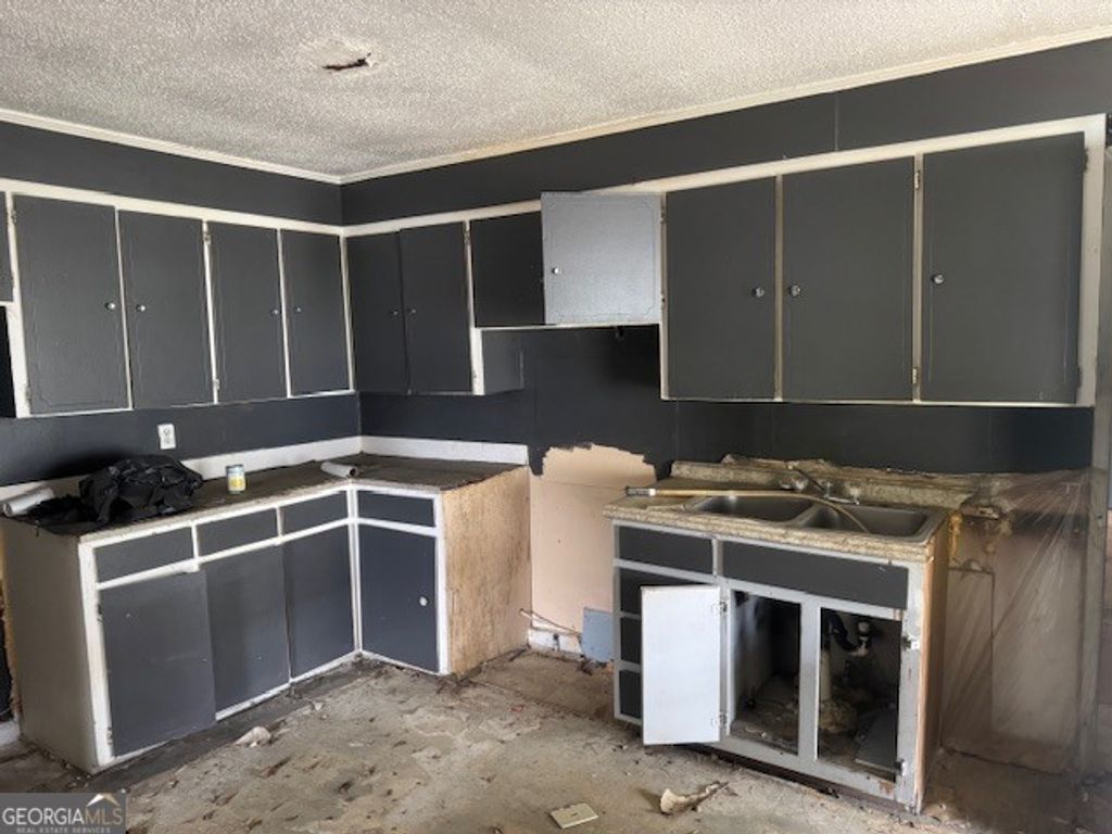 Photo of 107 Benjamin Street, Fort Valley, GA 31030 (MLS # 10723172)