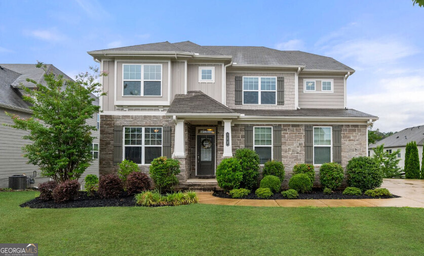 Stunning 6-Bedroom Home in Sought-After Hickory Manor - 307 Cochin Drive, Woodstock, GA. Welcome to your dream home in the desirable Hickory Manor community! Built in 2018, this spacious and beautifully maintained 6-bedroom, 5-bathroom home offers the perfect blend of modern comfort and timeless elegance. Step inside to discover an open-concept floor plan featuring a gourmet kitchen with stainless steel appliances, granite countertops, and a large island - ideal for entertaining and family gatherings. The main level has new vinyl floors, generous living space, and a bedroom with a full bath - perfect for guests or a home office. All new paint throughout the home and a water filtration system. The new fully finished basement with a full bedroom and bathroom provides even more living space - great for a media room, gym, or in-law suite. Enjoy outdoor living in the fenced-in backyard, perfect for pets and play, with a large balcony that has plenty of room to relax or entertain. Located in the family-friendly Hickory Manor neighborhood, you'll also enjoy access to community amenities including a swimming pool and playground. This home is just minutes from downtown Woodstock, top-rated schools, shopping, dining, and parks - offering the perfect combination of location and lifestyle. Don't miss this rare opportunity - schedule your showing today!