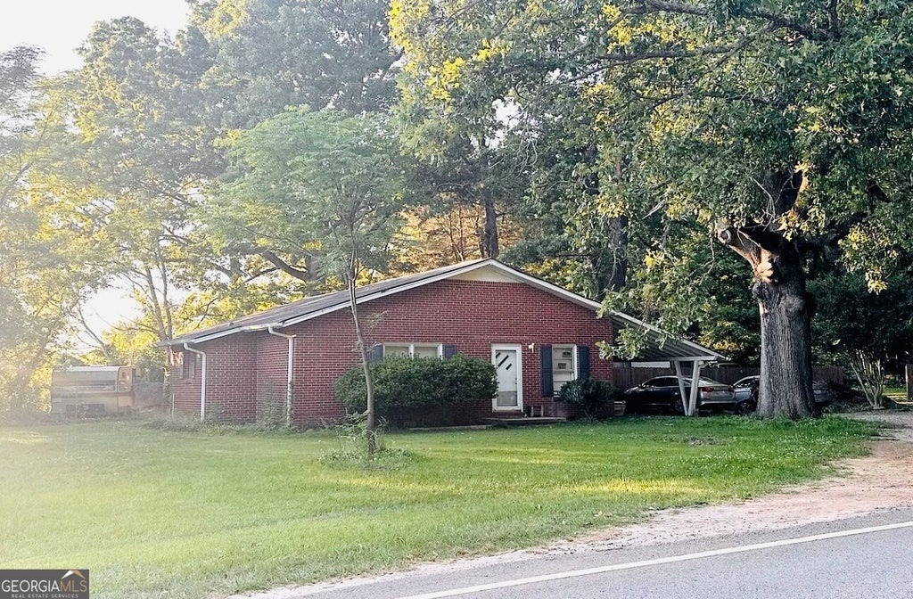 Photo of 1061 Hemphill Road, Stockbridge, GA 30281 (MLS # 10878430)