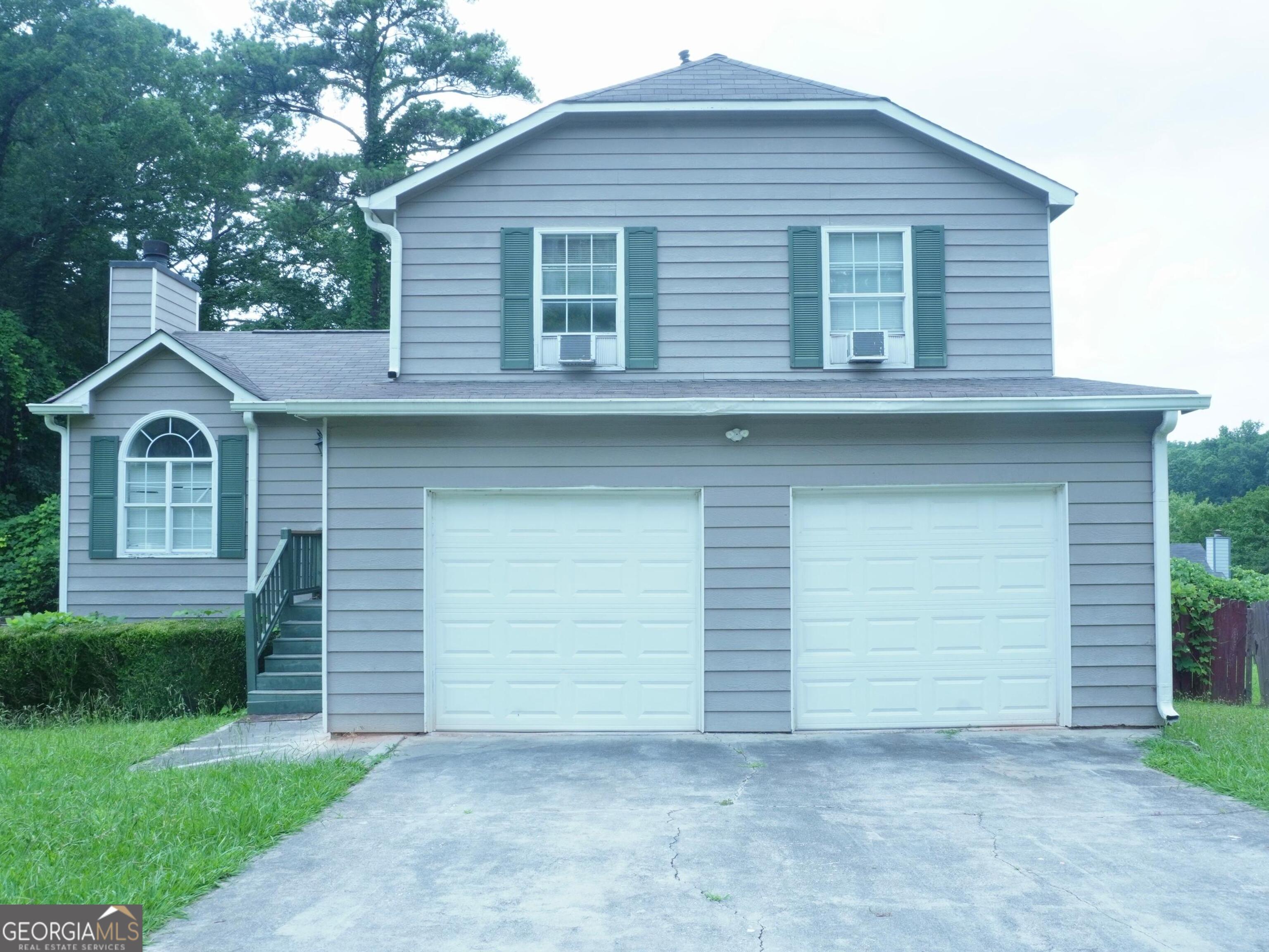 Charming 3BR/2BA, 1,360 sqft Home in Quiet South Fulton Neighborhood - Sold As-Is. Welcome to 5761 Antelope Trail! This 3-bedroom, 2-bathroom home offers a fantastic opportunity for investors or buyers looking to personalize a space. Nestled on a quiet street in a well-established neighborhood, this home features a spacious family room with fireplace, and eat-in kitchen. Recent upgrades include a newer roof, HVAC system, and stainless steel appliances. With a little TLC- a fresh coat of paint, and minor flooring repairs-this home can shine again. Sitting on a generous 8,755 sq ft lot with a 2-car garage, central HVAC, and close proximity to MARTA and major highways, this property is being sold as-is, offering excellent potential and value.