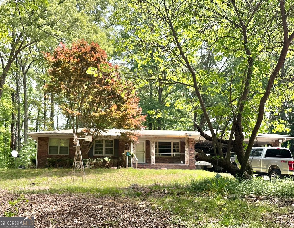 Photo of 2828 Flat Shoals Road, South Fulton, GA 30349 (MLS # 10736470)