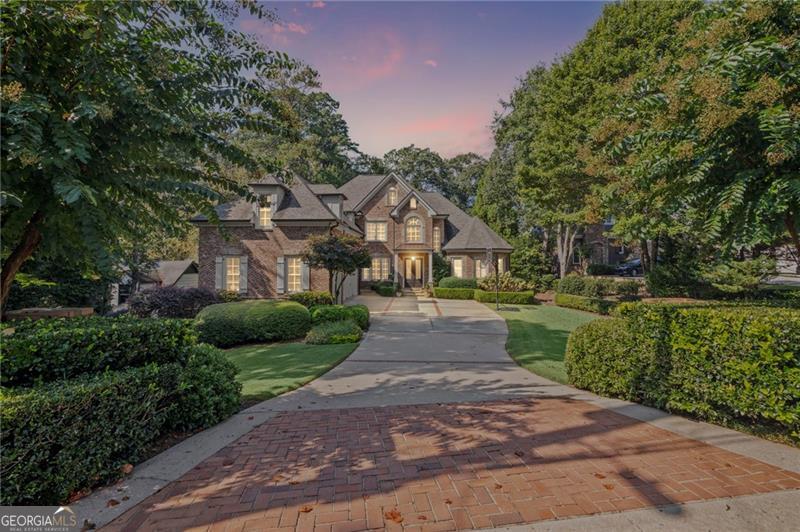 IMMACULATE HOME IN THE HEART OF CHASTAIN PARK! Step into timeless elegance and exceptional craftsmanship in this pristine residence, perfectly situated in one of Atlanta's most coveted neighborhoods-Chastain Park. From the moment you enter the grand two-story marble foyer, you'll notice the refined attention to detail that defines every inch of this remarkable home. The gracious fireside living room with coffered ceilings sets a welcoming tone, seamlessly flowing into an expansive dining room that easily accommodates 12+-ideal for entertaining in style. The heart of the home is a completely renovated kitchen, featuring a commercial-grade gas range with double ovens, an oversized island with prep sink, marble countertops, and exquisite custom cabinetry. A cozy breakfast room leads into the vaulted and beamed family room, where a stunning fireplace and panoramic views of the lush, private backyard create the perfect gathering space. Tucked between the kitchen and family room, custom built-ins frame a thoughtfully designed home office nook, providing an ideal workspace with both functionality and charm. The primary suite on the main level is a true retreat, offering a peaceful sitting area, private access to the covered patio and deck, and views of the beautifully landscaped backyard. The renovated primary bath is a true oasis. Upstairs, discover three spacious en-suite bedrooms with fully renovated bathrooms and walk in closets. In addition there is a versatile loft/bonus room-perfect for a playroom, media space, or additional office. The terrace level is nothing short of impressive with soaring 12-foot ceilings, multiple finished rooms, a full bar, billiards room, work out room, guest suite, fireplace, full bath, and two meticulously maintained storage rooms. Whether hosting guests or creating the ultimate recreation space, the possibilities are endless. Step outside to a covered patio just off the main-level family room, where you'll overlook a serene, private backyard with a gorgeous pool and plenty of room for a kick ball game! Live the Chastain lifestyle, with access to parks, top-rated schools, golf, tennis, horse stables, walking trails, and all the vibrant amenities this premier community has to offer.