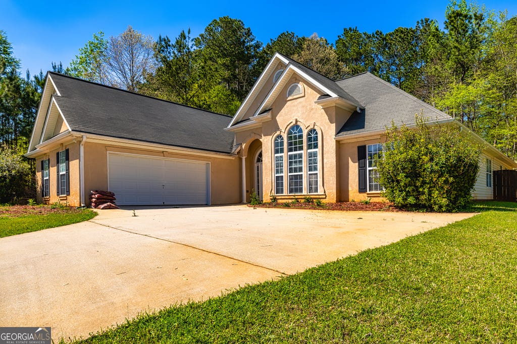 Photo of 230 Hidden Brook Trail, Fayetteville, GA 30215 (MLS # 10816760)