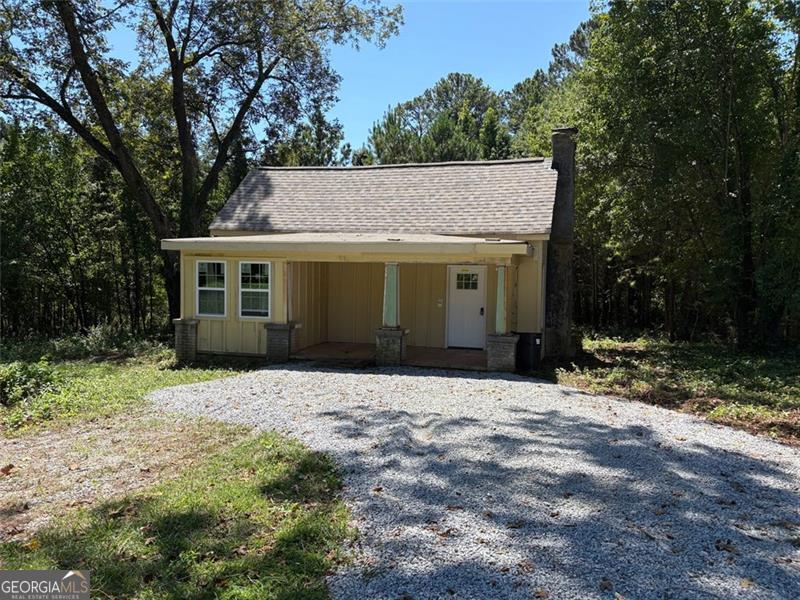 Investor Special! Seller has replaced the roof and siding-saving you time and money. Use your imagination to turn this property into a true charm! Full renovation still needed (electrical, plumbing, etc.). Floor plan available, showing the planned 4BR/2BA layout (currently unfinished). Great location near Stone Mountain Park. Property is vacant-complete all due diligence before submitting your offer. No blind offers or assignments. Sold AS-IS with proof of funds.
