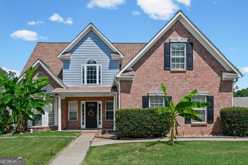 Photo of 5605 Martin Grove Drive NW, Lilburn, GA 30047 (MLS # 10806328)