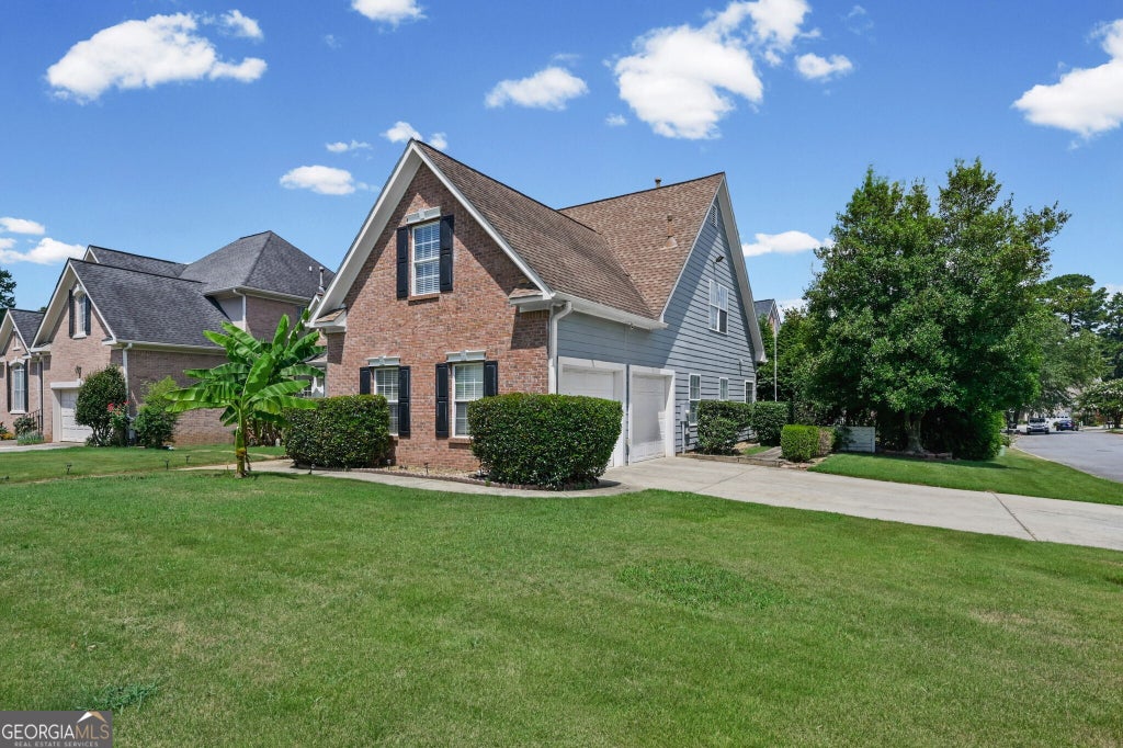 Photo of 5605 Martin Grove Drive NW, Lilburn, GA 30047 (MLS # 10806328)