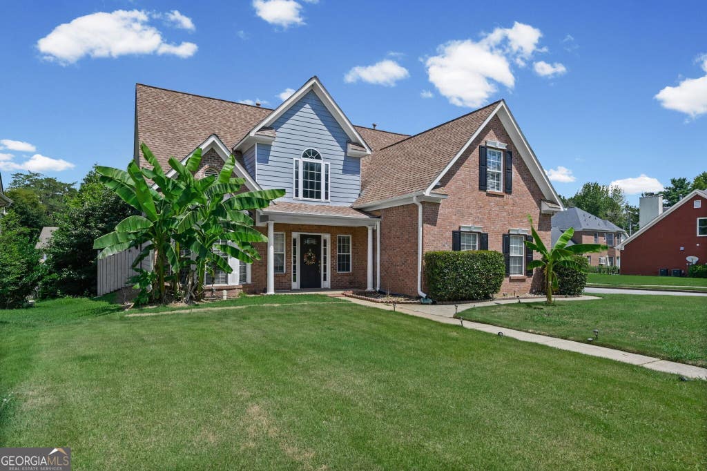 Photo of 5605 Martin Grove Drive NW, Lilburn, GA 30047 (MLS # 10806328)