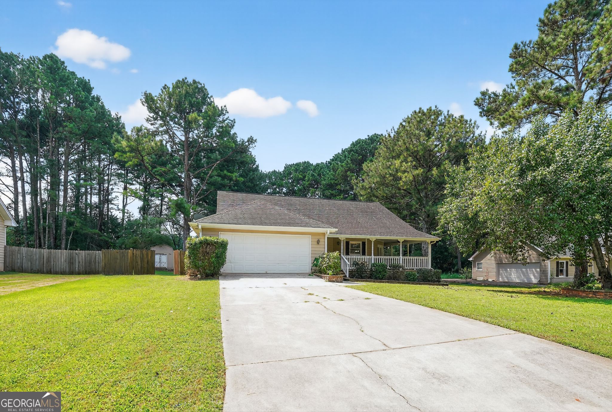 Step into this delightful single-level home nestled on over half an acre in the sought-after Trotters Walk community. Boasting approximately 1,707 sq ft of warm, functional living space, this residence offers 2 full baths and a classic layout that balances open comfort with everyday ease. A cozy fireplace adds inviting charm, while a generous garage provides useful storage and parking flexibility. Built in 1992, this well-built home offers timeless character and sits on a spacious lot with plenty of room to enjoy.