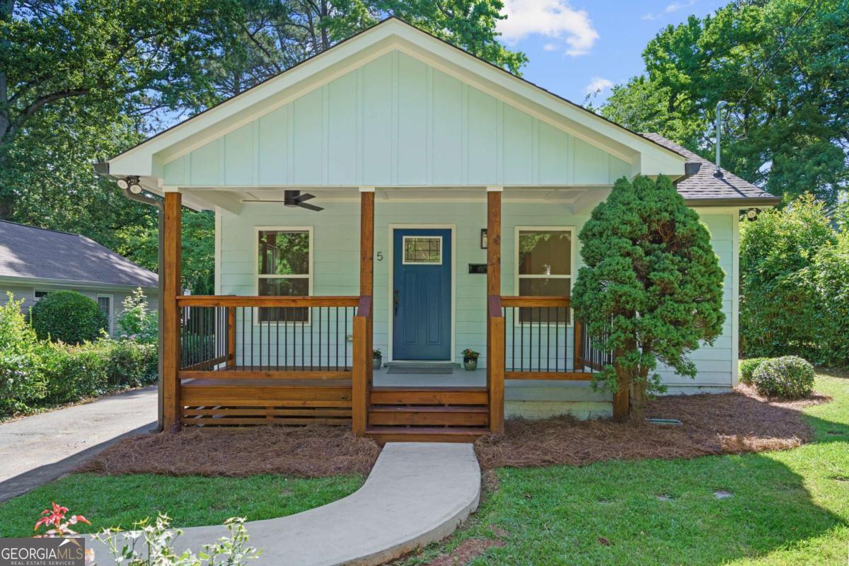 Avondale Estates Beauty!! This stunning fully renovated 3 bedroom, 2 bath home is a True Gem! This beautiful home has been renovated with care and precision. Every inch of this home has been thoughtfully redesigned for modern living, combining stylish finishes with top-tier craftsmanship. This home has been completely transformed from the ground up, including new electrical, plumbing, framing, roof, siding, tankless water heater and new HVAC system, ensuring peace of mind for years to come. The spacious open floor plan offers a seamless flow between the living and kitchen areas, including stainless steel appliances and quartz countertops. Perfect for both entertaining and everyday living. Both bathrooms have been redesigned with modern fixtures and elegant tile work. The oversized primary bedroom boasts a large walk-in closet and an ensuite bathroom. New flooring, fresh paint, recessed lighting, and energy-efficient windows complement the clean, contemporary style. The large backyard provides a perfect space for outdoor activities, gardening, or simply relaxing. Located in the prime neighborhood of Avondale Estates, This home offers the perfect balance of tranquility and convenience with shopping, dining, a weekend farmer's market and parks just a short walk away. Just two blocks from the newly revitalized main street of downtown Avondale Estates. Don't miss your chance to own this beautiful move-in-ready home. Schedule a tour today and see for yourself how every detail has been designed to exceed expectations! Photos have been virtually staged.