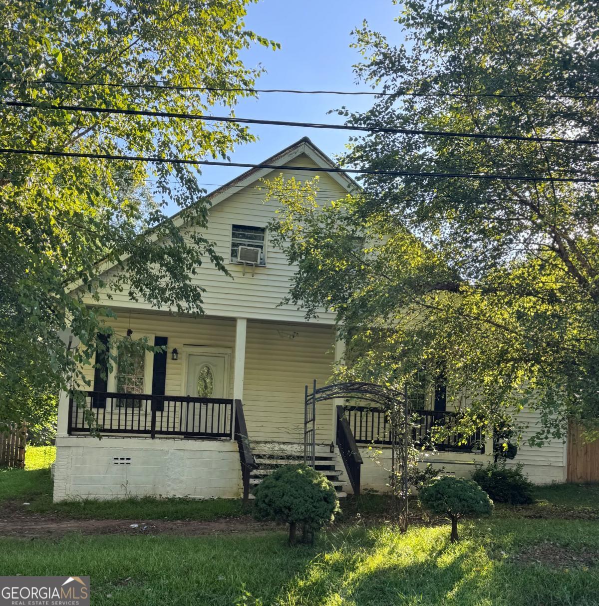 Charming 3 bedroom and 1 bath house with over 2400 sq ft of living space. Home was updated in 2022 with new flooring, cabinets, hot water heater, and mini split air conditioning units. Large fenced in back yard.
