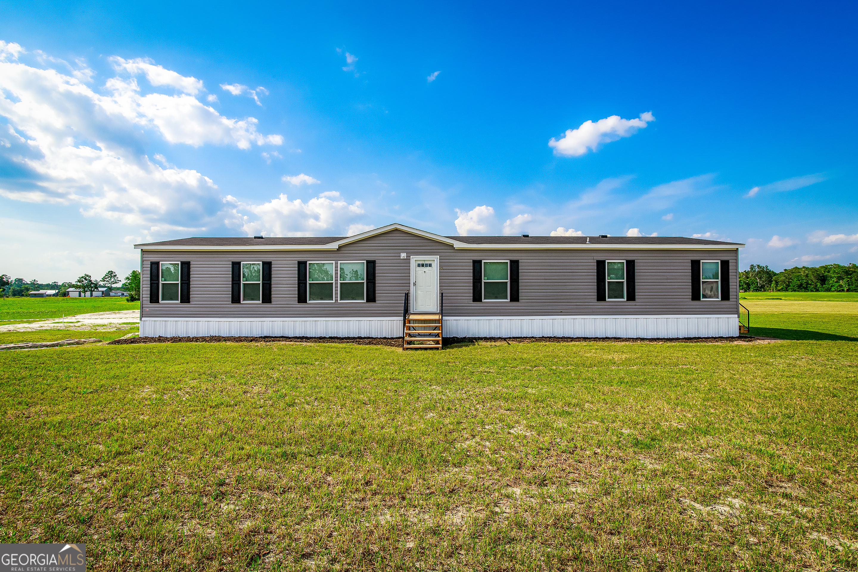 Brand New 4 Bedroom, 3 Bathroom Home on over 2 Acres! Welcome to your dream home-brand new construction offering modern comfort, space, and peace of mind. This beautifully designed 4-bedroom, 3-bathroom home is perfectly situated on a spacious 2.35 acre lot, providing both privacy and room to grow. Bring your 4-wheelers, fishing poles and animals as there are no restrictions here! Step inside to find an open, airy floor plan with quality finishes throughout. The bonus room offers flexible space that can be used as a second living area, game room, media room, or home office-tailored to your lifestyle. The primary suite is a true retreat, featuring a massive walk-in closet, dual vanities, and a spacious walk-in shower. Enjoy the added value of a 1-year builder warranty, giving you peace of mind as you settle into your new home. Outdoors, you'll love the fully stocked pond, perfect for fishing, relaxing or simply enjoying the view. This home is 10 minutes from the FL line and 15-20 from shopping and I-10. Don't miss the opportunity to own this move-in-ready gem with plenty of room for entertaining, relaxing, and making lasting memories.