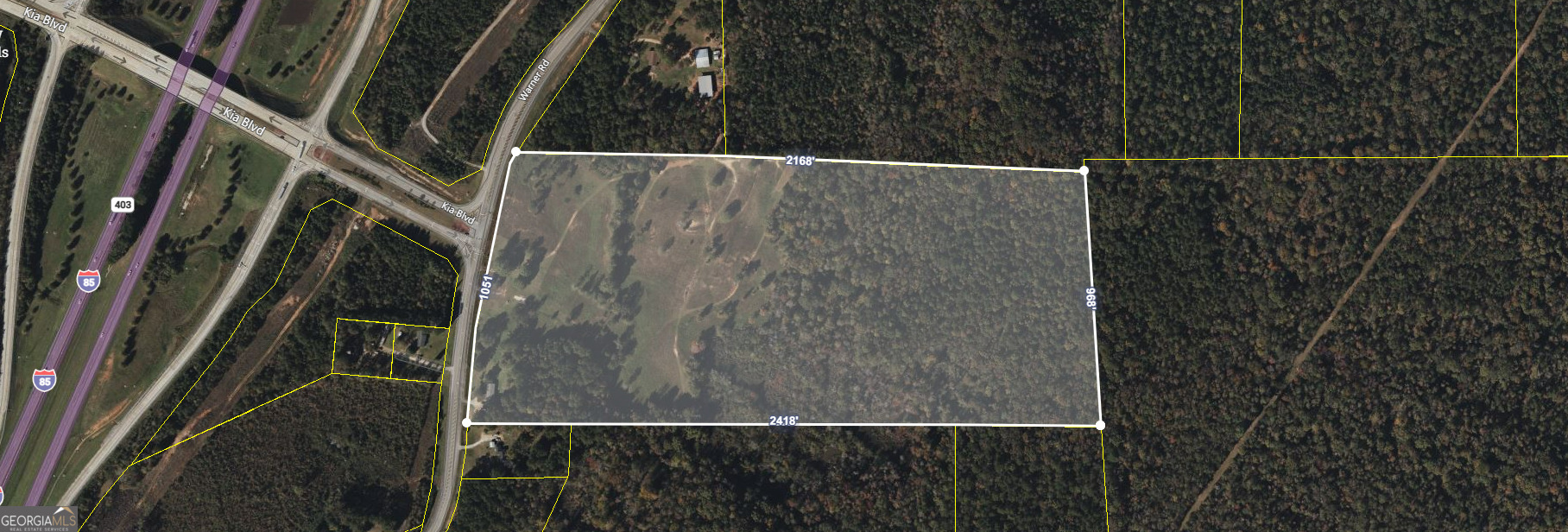 Welcome to 648 Warner Rd, West Point, GA! This incredible 46.95-acre property offers the perfect blend of tranquility and convenience. Just off of Kia Blvd and I-85, it provides super easy access to the nearby Kia Plant while still enjoying the peace and privacy of expansive acreage. Whether you're dreaming of a private retreat, starting a farm, building your dream home, or for potential commercial use, this property is perfect for you. Don't miss this rare opportunity to own a slice of West Point's beauty!