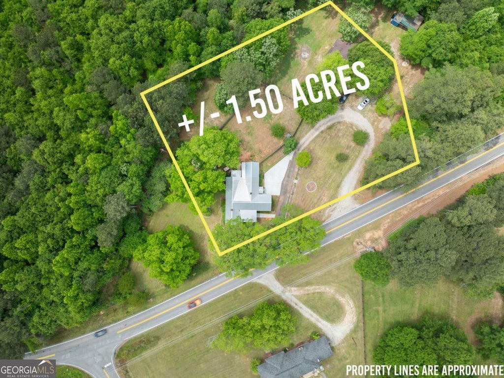 Photo of 1519 New Hope Church Road, Loganville, GA 30052 (MLS # 10853316)
