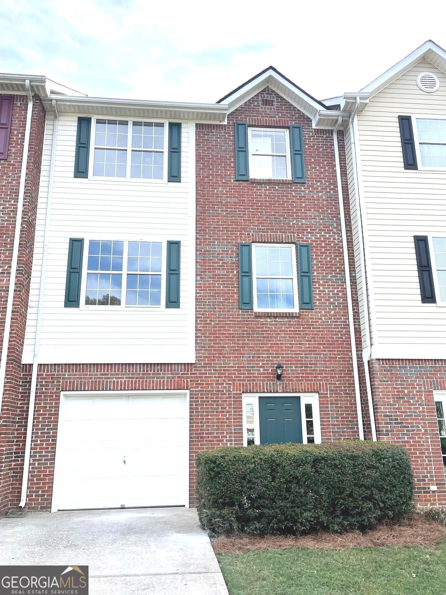 Wow! What a find! This "like New" townhouse is now available and ready for new owners. As you enter the townhome on the ground level, you'll enter a large foyer with a coat closet and access to the garage. On the main level you'll find a large family room with lots of light, a half bath for guests, the kitchen and breakfast room. The laundry room is adjacent to the kitchen. The main level also offers access to your new back deck and backyard. On the upper level, you'll find two spacious bedrooms, each with a walk-in closet and an en suite bath. This home has it all: NEW roof, NEW back deck, new sliding glass doors, new granite countertops in the kitchen and baths, new luxury vinyl plank flooring throughout, freshly painted, all new light fixtures, all new faucets, new toilets, new shutters, pressure washed, garage door serviced, NEW HVAC, NEW water heater. Low cost HOA only $50/month. Completely move in ready! Don't miss out on this treasure.