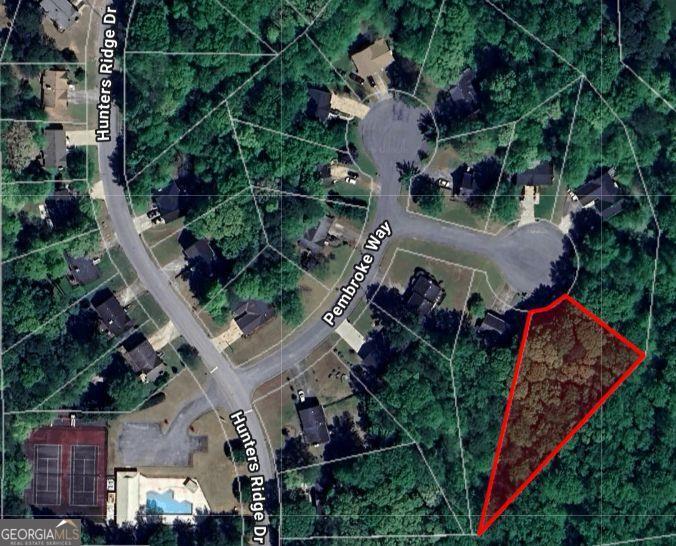 Prime residential lot in a quiet, established neighborhood of Douglasville! This affordable, large 0.60-acre lot offers a fantastic opportunity to build your dream home or an investment property. Conveniently located near I-20, shopping, dining, and schools, yet tucked away on a peaceful cul-de-sac street in a swim and tennis neighborhood. The lot provides a spacious footprint for a variety of floorplans and is ideal for a custom build. With limited inventory in the area, this property is priced competitively and won't last long. Don't miss the chance to own land in a growing community just 30 minutes from downtown Atlanta.