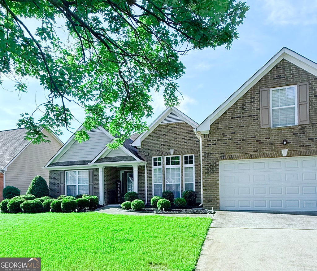 Photo of 319 Wildwood Point, Atlanta, GA 30349 (MLS # 10821846)