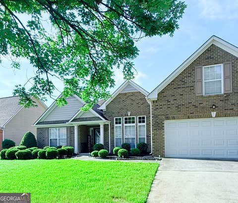 Photo of 319 Wildwood Point, Atlanta, GA 30349 (MLS # 10821846)