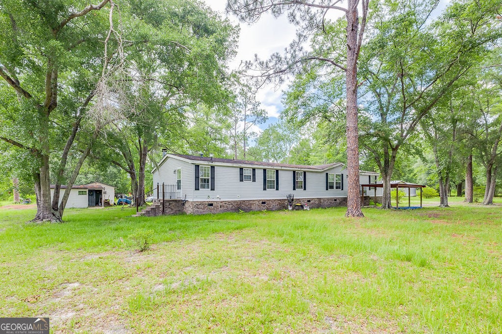 Photo of 3104 Courthouse Road, Guyton, GA 31312 (MLS # 10791209)