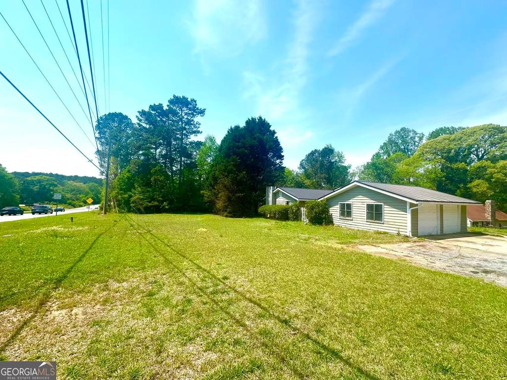 Photo of 100 Lakeview Lane, Fayetteville, GA 30214 (MLS # 10728165)