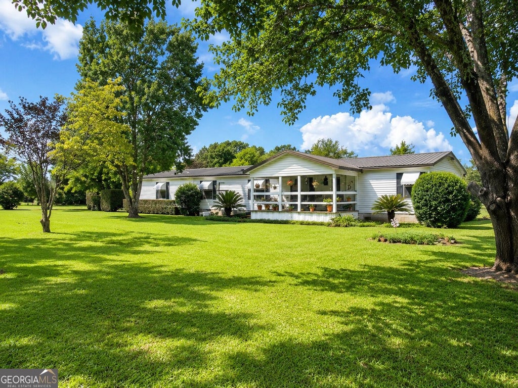 Photo of 1513 Macgillicuddy Drive, Macon, GA 31216 (MLS # 10835547)