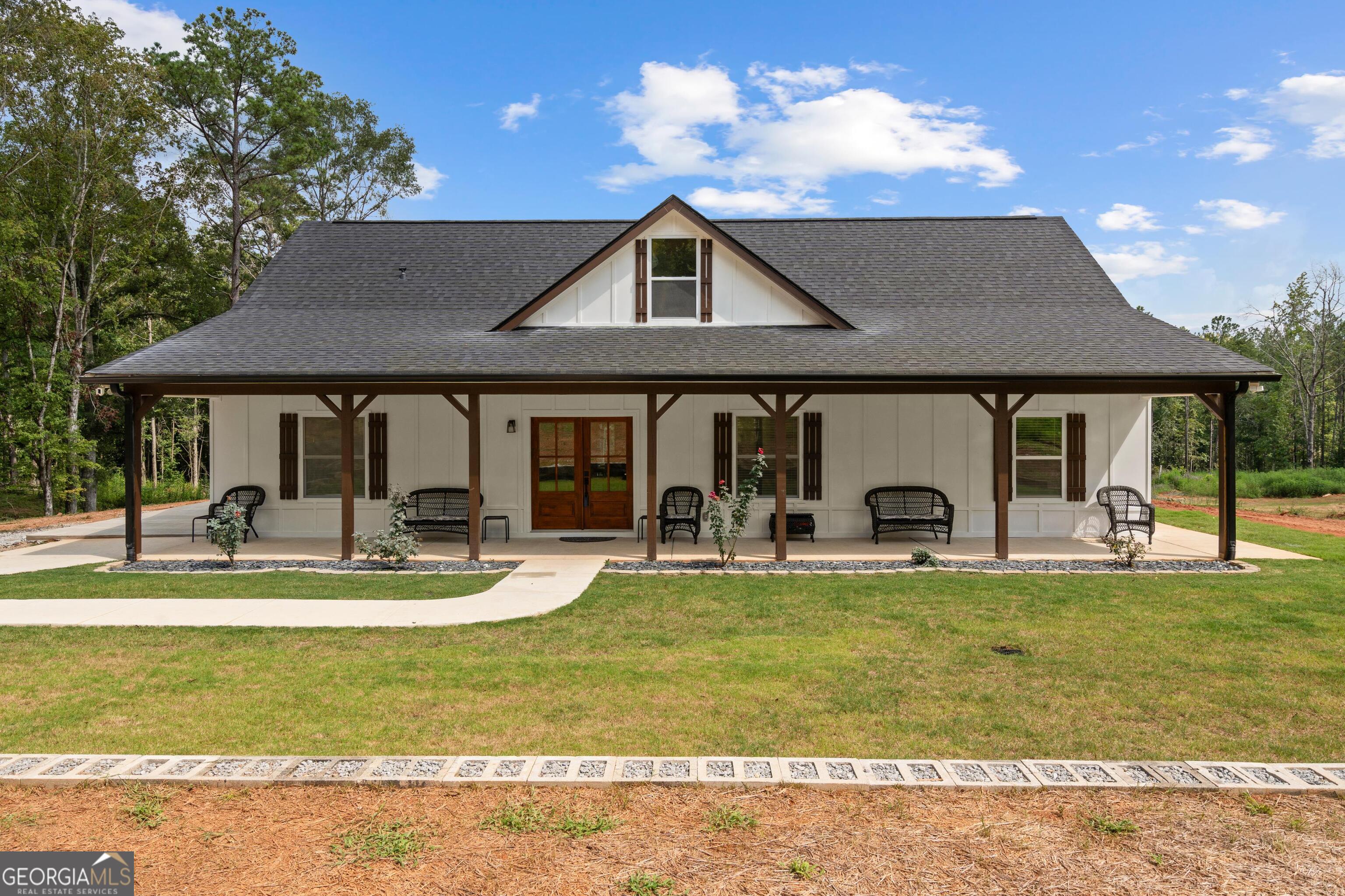 Welcome to this stunning farmhouse-style ranch offering the perfect blend of comfort, charm, and wide-open space. Nestled on a beautifully private 4.13-acre lot, this one-level home features a thoughtfully designed open floor plan with generous living spaces, ideal for both relaxing and entertaining. Step inside to find a bright and airy interior with timeless farmhouse finishes, a spacious kitchen that flows effortlessly into the living and dining areas, and large windows that fill the home with natural light, large walk-in closet and bathroom in primary bedroom. Outside, enjoy serene views and unmatched privacy on your oversized patio. Barn on the property offers endless possibilities-perfect for hobbies, storage, or even small-scale farming. If you're looking for peaceful country living with modern style and convenience, this property is a must-see!