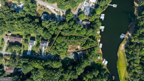 Photo of 6182 Hutchins Drive, Buford, GA 30518 (MLS # 10840567)