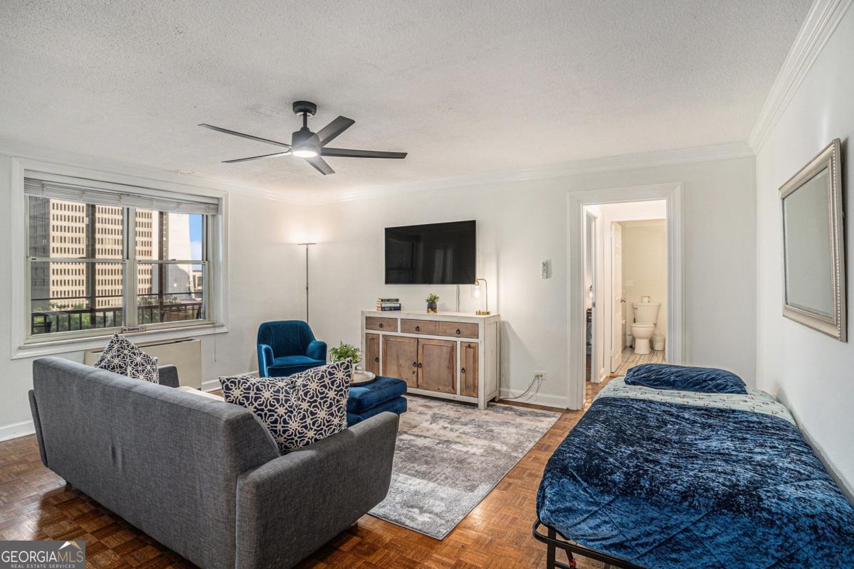 LOCATION, LOCATION, LOCATION! Minutes from Mercedes-Benz Stadium, Georgia State, Georgia Tech, and the Atlanta University Center - this central spot makes the unit a clear winner. With on-site management and a dedicated property manager, it's a truly hands-free operation. This fully furnished short-term rental comes with a proven track record as an active Airbnb, generating over $19,000 in 2025 alone. Investors will appreciate its strong cash flow and plug-and-play setup: $154 average nightly rate Up to 68% occupancy with consistent 50-65% during peak seasons $3,294 in monthly revenue at peak (July 2025) 3-4 night average stay length driving frequent turnover and reliable bookings Multiple booking channels (Airbnb, HomeAway, Hopper, direct website) ensuring diversified demand Whether you're expanding your short-term rental portfolio or stepping into the market with a property that's already performing, this unit offers immediate income with upside potential as Atlanta's demand continues to grow.