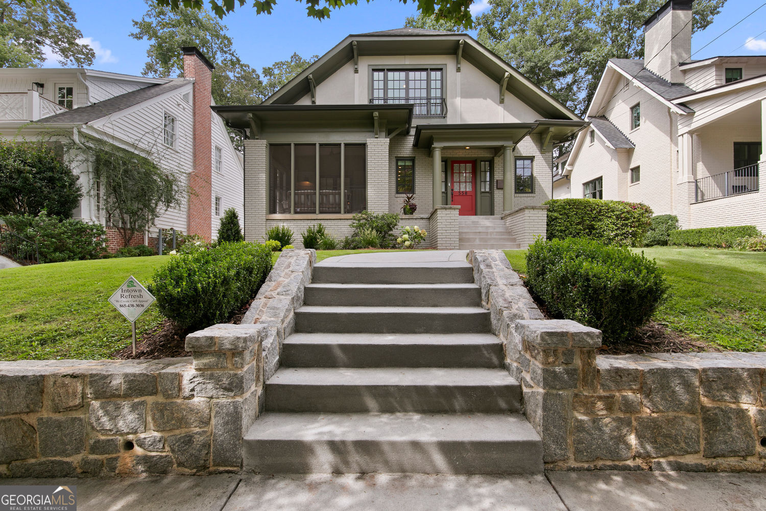Living on Park Drive is the definition of intown Atlanta luxury-just five doors from Piedmont Park. This 2022 Moon Brothers Inc. renovation reimagines the classic Virginia-Highland bungalow into a magazine-worthy showpiece, seamlessly blending timeless charm with modern sophistication. Step inside to an open-concept floor plan designed around today's lifestyle, featuring a new main-level primary suite, dual-sided fireplaces with gas starts, soaring exposed beams, and refinished original hardwoods that flow throughout. Every detail has been considered: automatic designer window treatments, custom crown molding, high-end lighting, and walk-in cedar closets for that elevated touch. The chef's kitchen is a true showstopper-custom cabinetry, striking black granite countertops, exposed brick, an Ilve oven, Monogram refrigerator, Bosch appliances, and a reverse osmosis water filtration system, all anchored by a handcrafted vent hood that feels more like art than utility. Beyond the interiors, this home has undergone a full-scale structural and systems transformation: dual-zoned HVAC, spray foam insulation, whole-house tankless water heater, encapsulated basement, new windows, roof and gutters, new electrical and panel, and more. For effortless living, a reimagined mudroom with custom cabinetry makes laundry as chic as it is functional. The outdoor living is just as remarkable. A screened-in front porch welcomes you, while a new slate back patio and granite stairs lead to a flat grassy backyard-a blank canvas for your pool and garden dreams. A rare double-sided driveway with custom electric gates offers unmatched convenience: pull into your gated carport, unload with ease, and exit forward through the second gate. From the tree-lined sidewalks of Park Drive, stroll to Piedmont Park, the BeltLine, and Virginia-Highland's beloved restaurants and shops. Few homes offer this level of design, location, and lifestyle-this is intown Atlanta living at its absolute best.