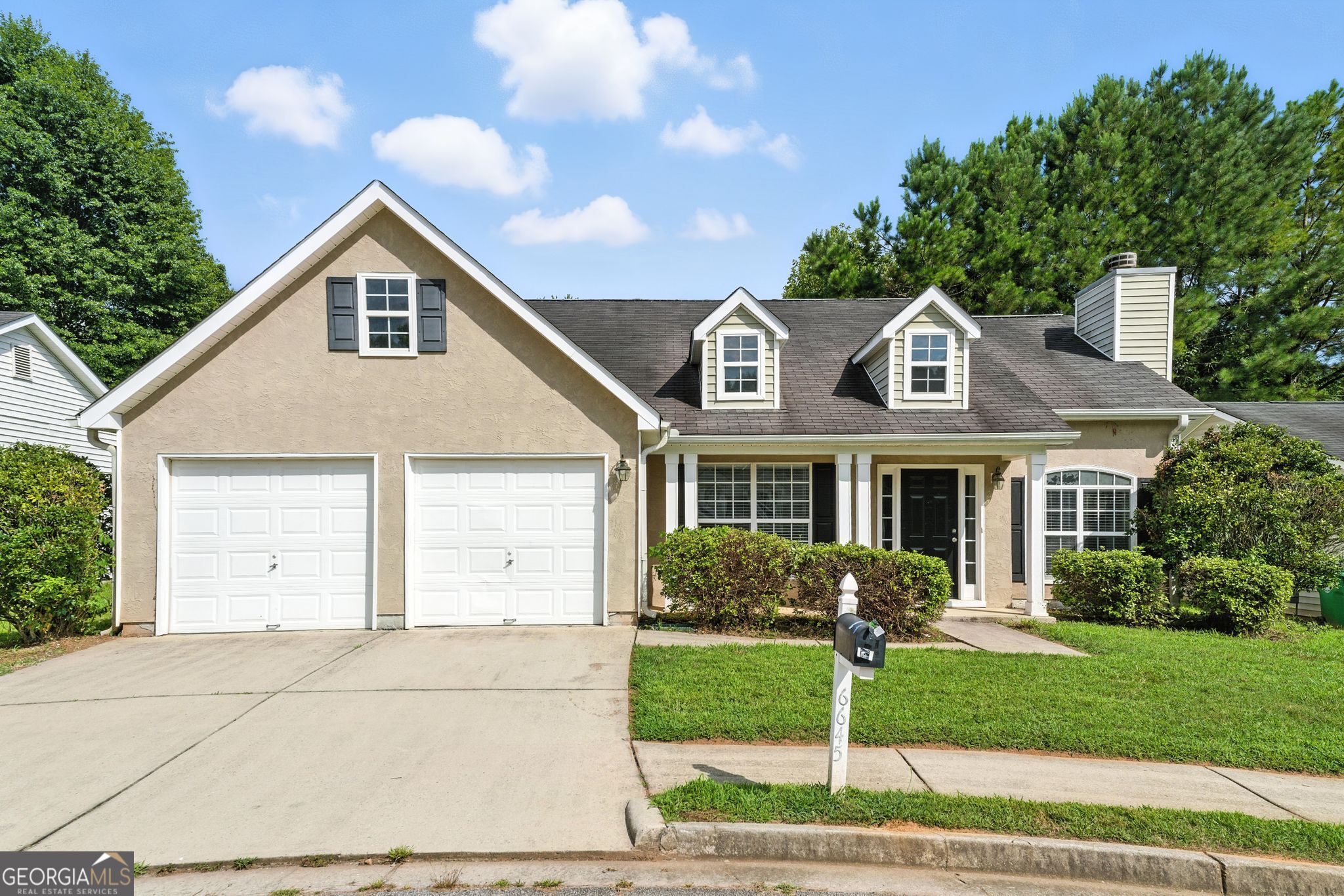 Welcome to this charming 3-bedroom, 2-bath ranch-style home nestled in the heart of Stonecrest. This well-maintained property features a spacious, open layout with high ceilings, nice flooring, and a cozy fireplace in the living room. The kitchen offers white cabinetry, black appliances, a pantry, and a bright breakfast nook-perfect for morning coffee. The split-bedroom floor plan provides added privacy, with a generous primary suite that includes a walk-in closet and an en-suite bathroom. Located in a quiet, established neighborhood just minutes from The Mall at Stonecrest, Arabia Mountain trails, and local parks. With great curb appeal and move-in-ready condition, this home is an excellent opportunity for both homeowners and investors. Don't miss your chance to make this inviting property your own!
