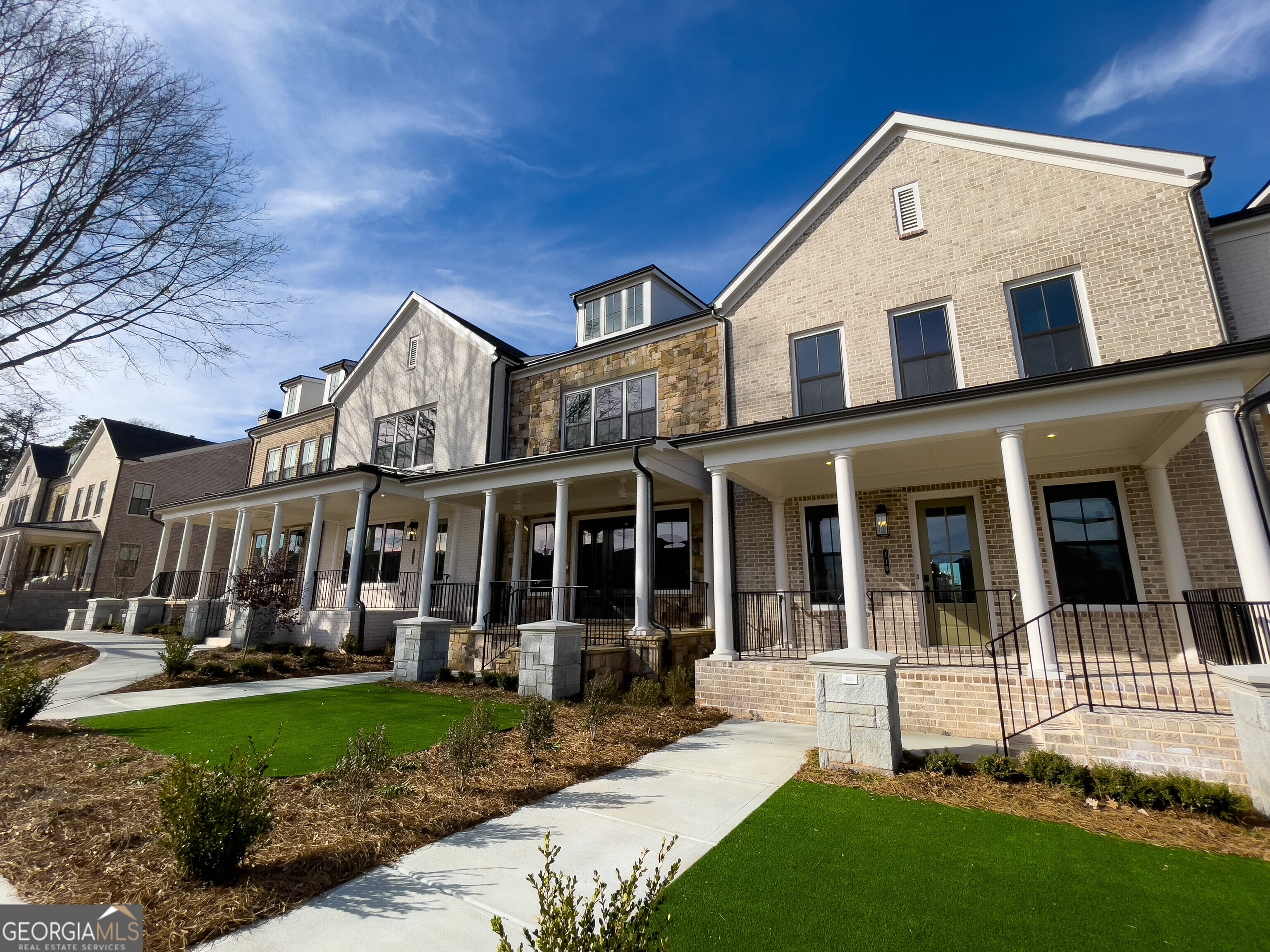 Introducing Empire Chiswick's Newest Plan - The Harleigh Basement Move-In Ready! Welcome to The Harleigh Basement, a stunning new offering in the heart of Empire Chiswick, Downtown Alpharetta's premier luxury townhome community. MOVE-IN READY, this home boasts a beautiful brick elevation with street-level entry from Thompson Street, perfect for returning home after enjoying a stroll through Downtown Alpharetta or shopping and dining at Avalon. Designed with luxury in every detail, Empire Chiswick combines classic charm with modern convenience. This exclusive 43-home community connects to the Alpha Loop and offers four architecturally inspired districts, blending timeless brick design with walkable access to the city's best amenities. Much like its namesake in London, Chiswick is a peaceful retreat at the edge of vibrant urban life-complete with semi-private courtyards, formal gardens, and richly appointed interiors. The Harleigh plan is elevator-ready and offers exceptional flexibility and elegance throughout. Key Features: First Floor: Spacious Rec Room ideal for an office, guest suite, or in-law space with a full bathroom Main Level: Open-concept living featuring a fireplace in the Family Room, oversized kitchen island perfect for entertaining, chef's kitchen with high-end stainless appliances, 42" soft-close cabinets, walk-in pantry, butler's pantry, elegant dining room, and a tech/drop zone Third Floor: Luxurious Primary Suite with spa-like bath including walk-in shower with bench, soaking tub, and custom walk-in closet. Two additional bedrooms share a full bath, plus a separate laundry room By Appointment Only - Contact us today to schedule your exclusive tour of our beautifully designed model home and experience the best of modern living in a timeless setting.