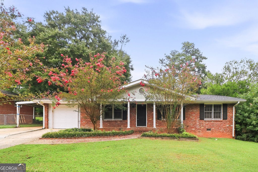 Photo of 2321 Hollyridge Drive SW, Marietta, GA 30060 (MLS # 10841943)